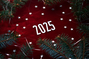 Wall Mural - new year red 2025 background. number of the coming year in christmas decoration.