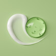 © vpanteon - Moisturizing cream, face serum bubble texture on green, cosmetic product hydration concept 3d rendering