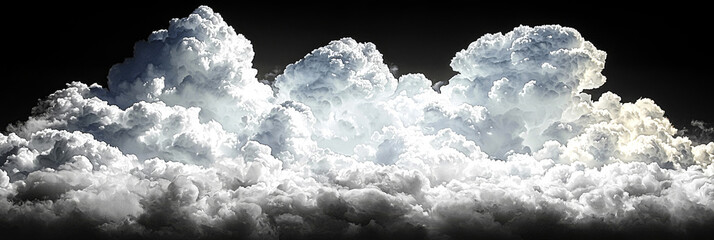 Poster - White fluffy clouds against a black sky.