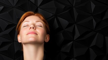 Wall Mural - Serene woman with closed eyes against abstract black background