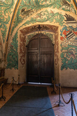 Indoor mosaic painted walls of Old Town Hall at Old Town Square in old part of Prague in the Czech Republic