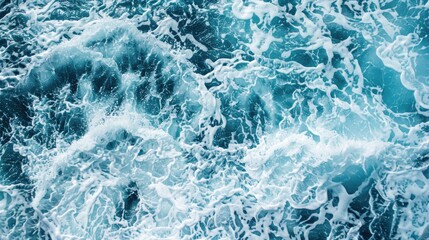 Canvas Print - Blue sea water with white foam as abstract background for nature concept.