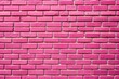 © Introvertia - Bright pink brick wall texture for background abstract symmetry and pattern concepts