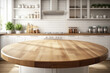 © kossovskiy - Empty wooden round table in modern kitchen