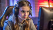 © Andrei - A young girl in a gaming headset plays attentively in front of a computer monitor.