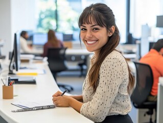 attractive hispanic woman in her late thirties, wearing business casual attire and smiling