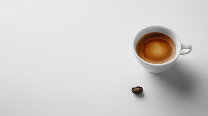 Wall Mural - Flat lay of a steaming cup of espresso on a minimalist white table, with a single coffee bean nearby. No logo, no people.