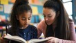 © somneuk - A student using a braille book in a classroom setting, with a teacher providing support
