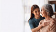 © SolaruS - Close-Up Depiction of a Woman Assisting an Elderly Person with Care and Support