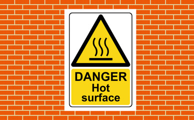 Danger hot surface sign on a wall on a wall