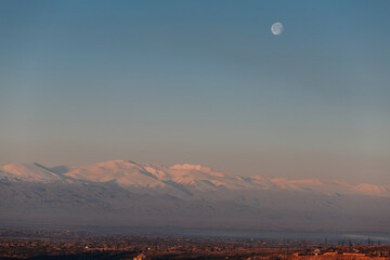 moon over volcanic ridge Ararat