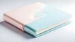 © Phichaphat - Pink and Blue Notebook with Embossed Design