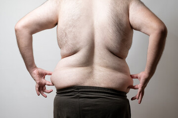 Overweight Man's Back View..