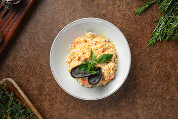 Wall Mural - Portion of seafood risotto with mussel shells