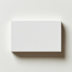 Wall Mural - A horizontal, flat rectangular box template in white, placed on a clean, simple background with soft shadows