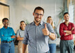 © Lumos sp - young business people meeting office portrait man businessman teamwork group success together startup start up smart intelligent student education training leader thumbs up thumb up approval sign