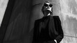 © indyntk - Monochrome outfit modern urban fashion sleek textures strong contrast dynamic poses high-fashion photography editorial street style