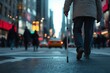 © Hafiz - Blind person using a cane on a busy street street photography, with copy space