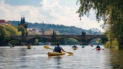 A scenic view of the Vltava River with kayakers and paddle boats against the backdrop of Prague's bridges.