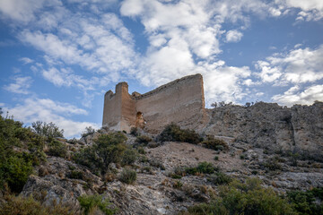 Remains of the walls of the medieval castle of Cieza (Alcazaba de Siyasa), Region of Murcia, Spain, with morning light