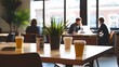 © Preecha - A casual photo of a business negotiation taking place in an office lounge, with coffee cups on the table and a relaxed yet professional atmosphere