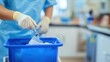 © bajita111122 - A healthcare worker disposing of a used syringe in a sharps container, focus on the disposal, blurred clean clinic background.