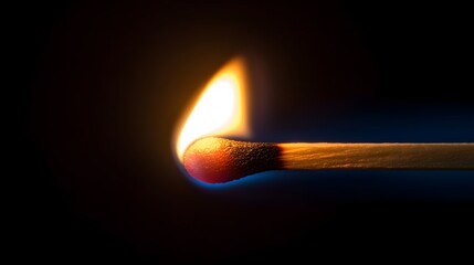 Phosphorus Match: A close-up of a lit match head, with the red phosphorus igniting and a small flame, set against a dark background.
