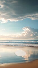 Wall Mural - Blank circle on a sandy beach with turquoise water and fluffy clouds in the sky.