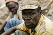 © Denis Tuev - portrait of a working man of African appearance