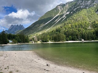 Early autumn over the alpine lake Lago del Predil or Lago di Raibl (Cave del Predil Lake) - Inizio autunno sul alpino Lago del Predil (Cave del Predil, Italia) or Predilsko jezero