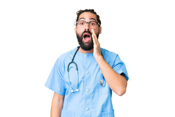 Wall Mural - Young doctor man over isolated chroma key background with surprise and shocked facial expression