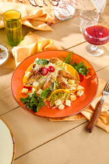 Canvas Print - Fresh Caesar Salad in Tortilla Shell on Rustic Table with Wine