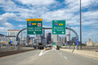 © hasan - South bound interstate highway 90 through the downtown of Providence. Boston roads and signboard