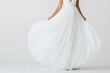 © A2Z AI  - Female Model Dressed in a Flowing White Gown | Elegant Fashion and Timeless Beauty in Motion