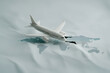 © A2Z AI  - Plane Soaring Above a White World Map | Global Travel and International Flight Concept