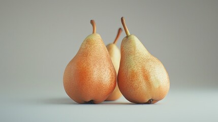 A pair of fresh pears placed side by side on a wooden table