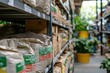 © Kitta - Nourishing Growth: A Colorful Array of Fertilizer Bags Line a Garden Center Shelf, Ready to Transform Gardens.