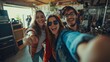 © Stefan - Three happy young people cheerful teenagers, a group of friends women and a man, musicians or musical artists with joyful expressions, taking a selfie in a garage during a rehearsal, friendship, music