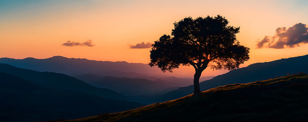 Sticker - Silhouette of a Tree at Sunset Over Mountains