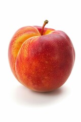 Wall Mural - A single red apple sits on a white surface, ready for eating or decoration