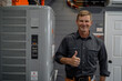© Vera - male electrician giving a thumbs up gesture next to an air conditioner, showcasing his expertise in maintenance and repair services.