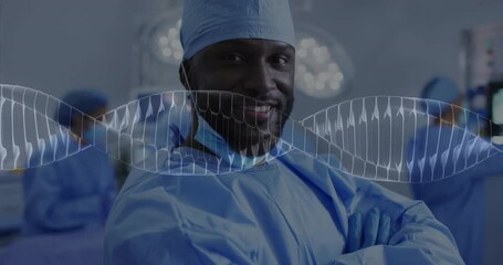 Wall Mural - Animation of dna strand over afcian american male surgeon