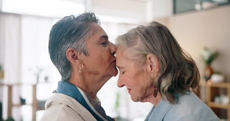 Sticker - Mature women, love and forehead kiss in home for care, support and trust in relationship. Senior lesbian couple, romantic gesture and affection in living room for security, wellness and commitment