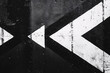 © agnes - bold, grungy pattern of white arrows pointing to the left on a dark textured background, symbolizing direction and movement