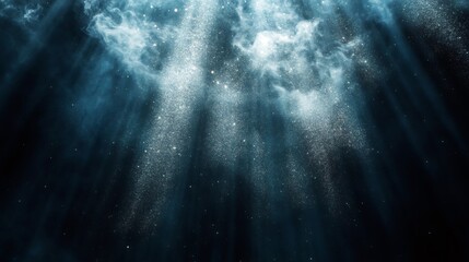 Wall Mural - Abstract background of white glowing light beams and white particles of dust against a dark blue background.