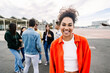 © Xavier Lorenzo - Portrait of young african american student girl smiling at camera standing outside