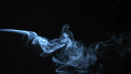 Wall Mural - animation of blue smoke on black background