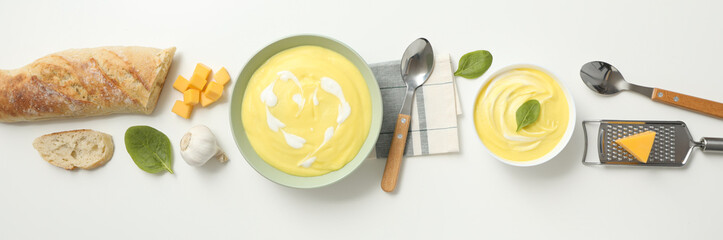 Cheese soup in a bowl on a white background