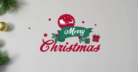 Wall Mural - Animation of merry christmas text over christmas decorations