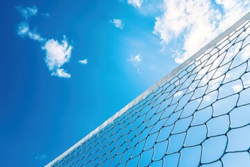 Net for tennis or volleyball under blue sky